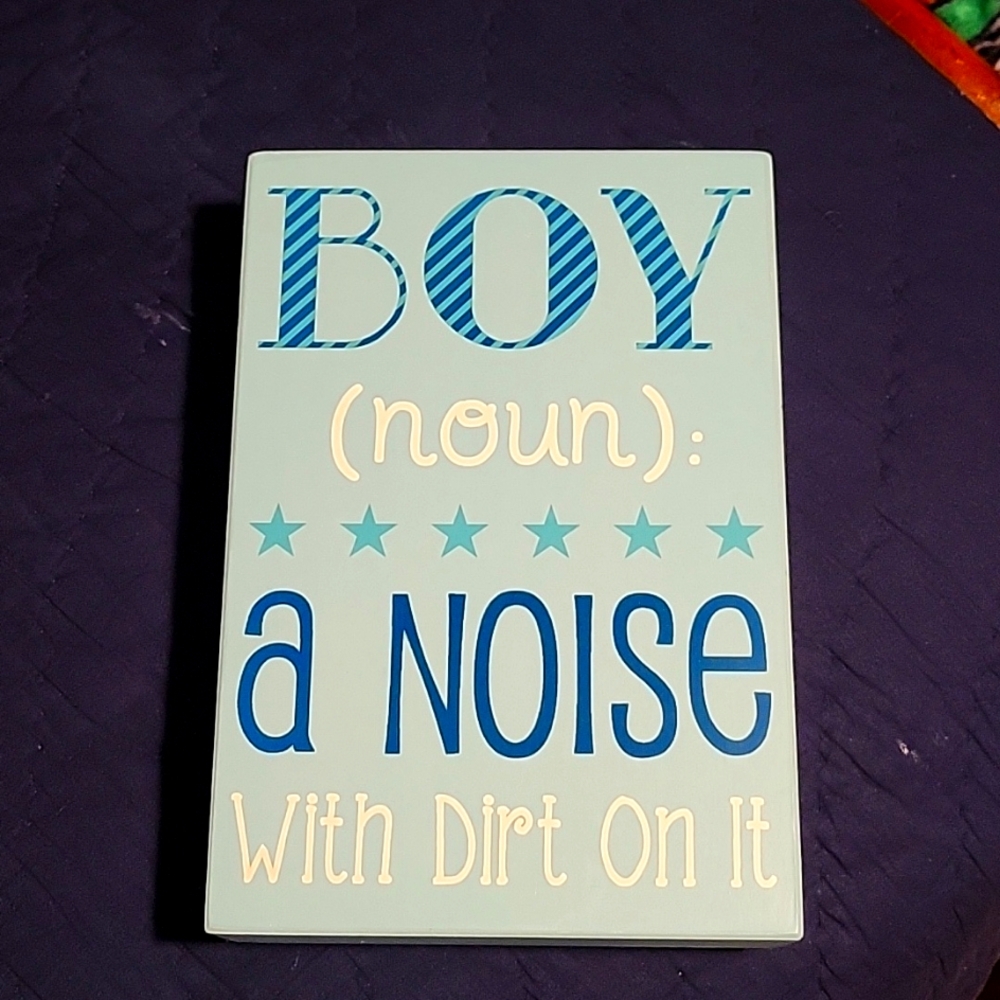 Wooden plaque,  hangs on wall